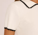 Short Sleeve Scalloped Trim Polo Sweater In Cream Black 6