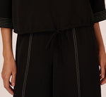 Three Quarter Sleeve Drop Shoulder Tie Waist Top In Black Ivory 5