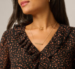Long Sleeve V Neck Ruffle Top In Black Amber Dot 5