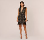 Cap Sleeve Lace Cocktail Dress With Feather Trim In Black Nude 1